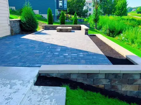 Paver patio with seating area and landscaping in Lakeville, MN
