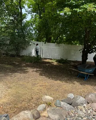 Cleared area with stone border and landscaping in Lakeville, MN