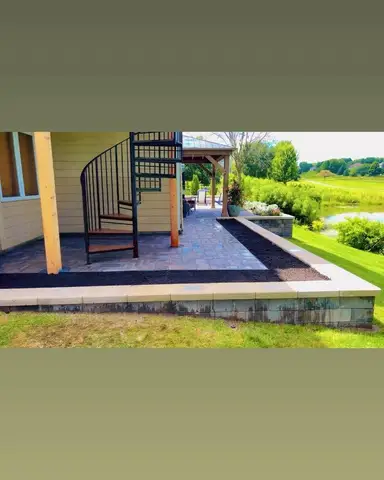 Paver patio with landscaping and seating area in Lakeville, MN