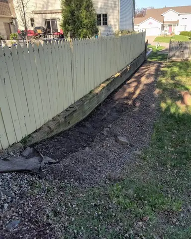 Gravel pathway with wooden fence in Lakeville, MN