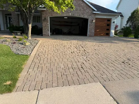 Textured paver driveway leading to garage in Lakeville, MN