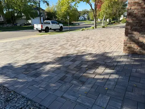 Paver driveway with shadows from trees in Lakeville, MN