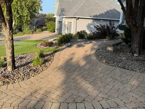 Curved paver pathway with landscaping in Lakeville, MN